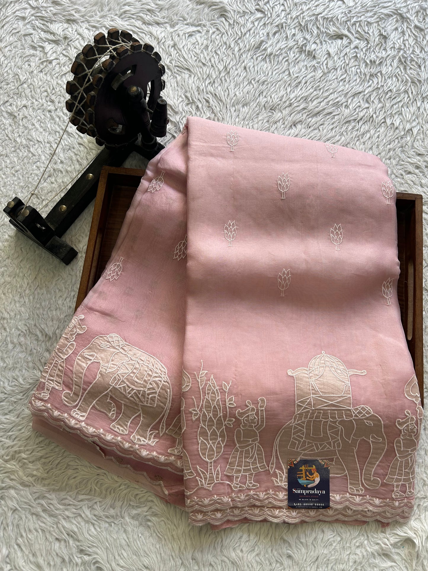Banarasi Kora Saree Pastel Pink Colored Complemented with a  Machine Embroidery And Scallop Border.