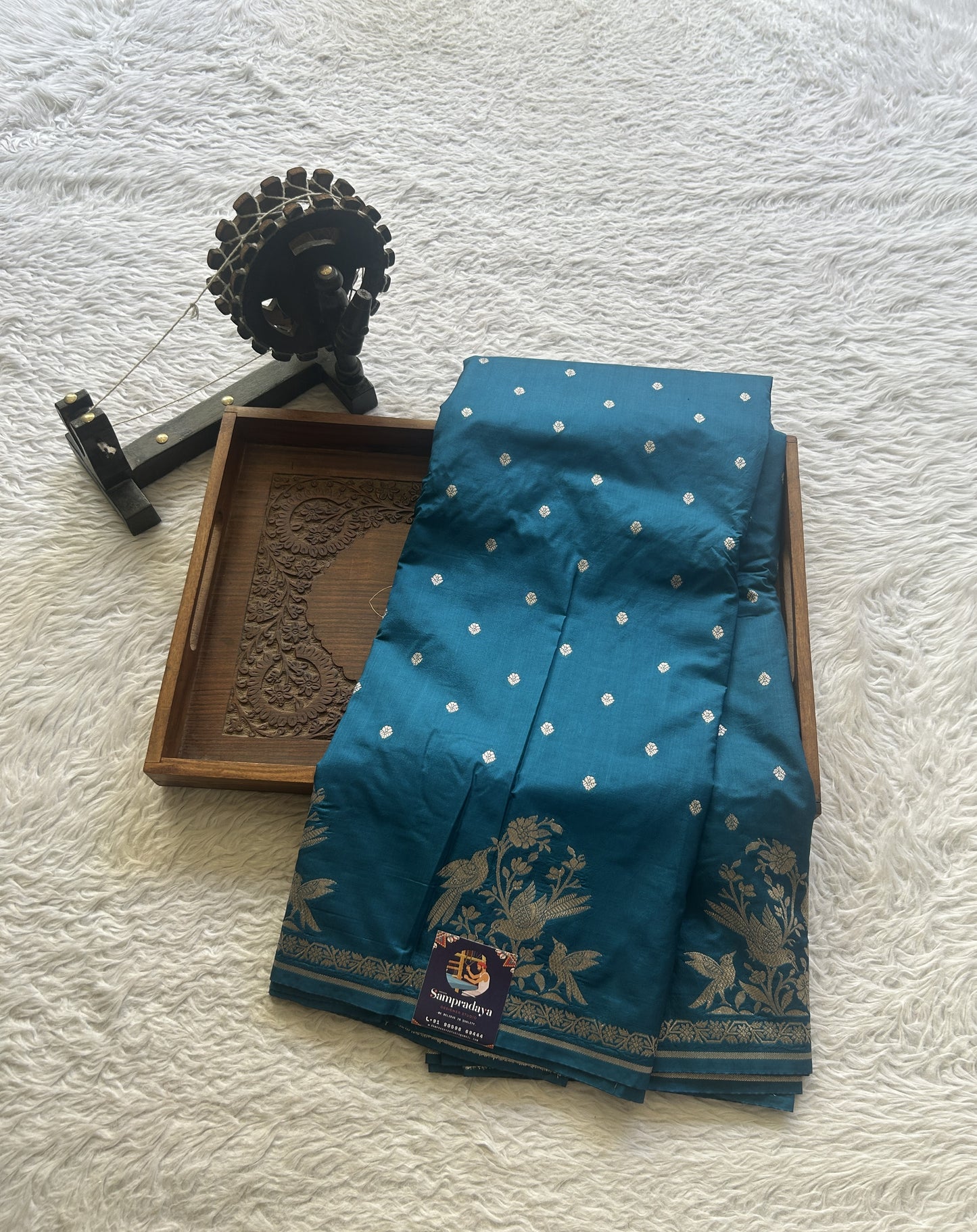 Semi Raw Silk Saree Peacock Blue Colored Elegantly Paired with a Buti Border. - Sampradaya Designer Studio