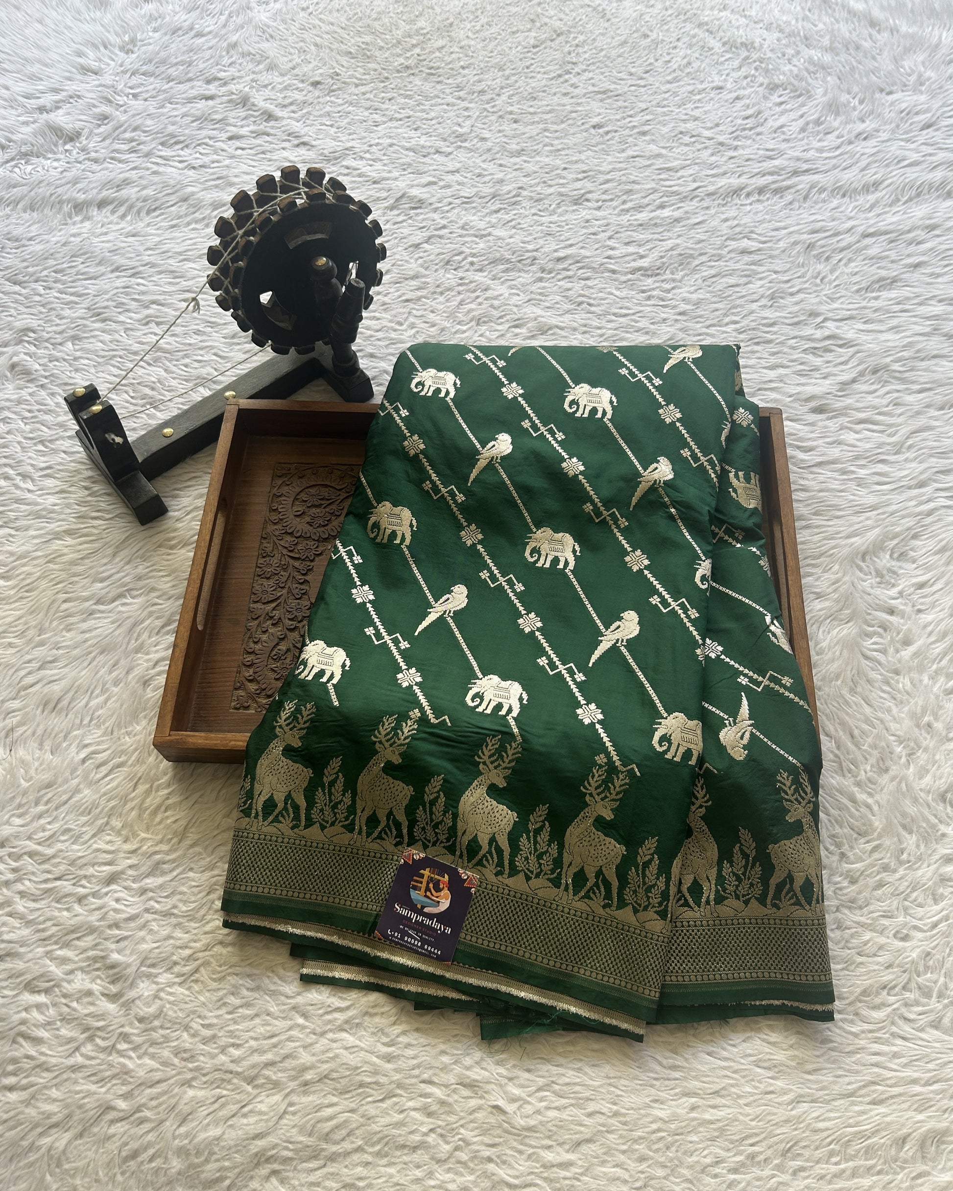 Semi Raw Silk Saree Bottle Green Colored Elegantly Paired with a Zari Border. - Sampradaya Designer Studio