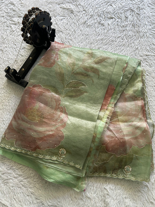 Banarasi Kora Saree Pistachio Green Colored Complemented with a Scallop Border.