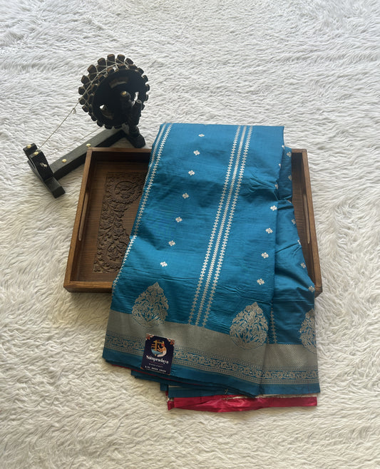 Semi Raw Silk Saree Teal Blue Colored Elegantly Paired with a Zari Border. - Sampradaya Designer Studio