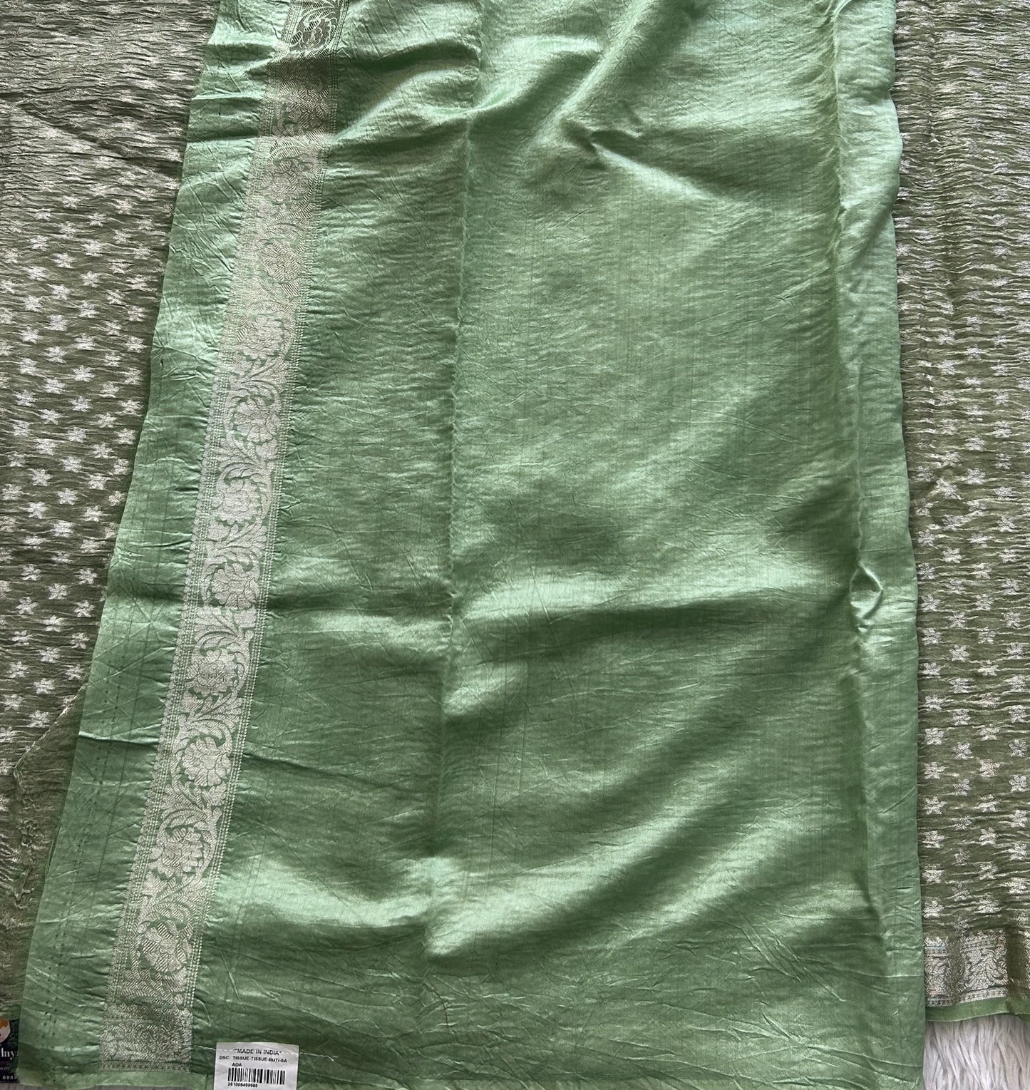 Banarasi Fancy Crushed Saree Light Green Colored Complemented with a Silver Zari Border. - Sampradaya Designer Studio