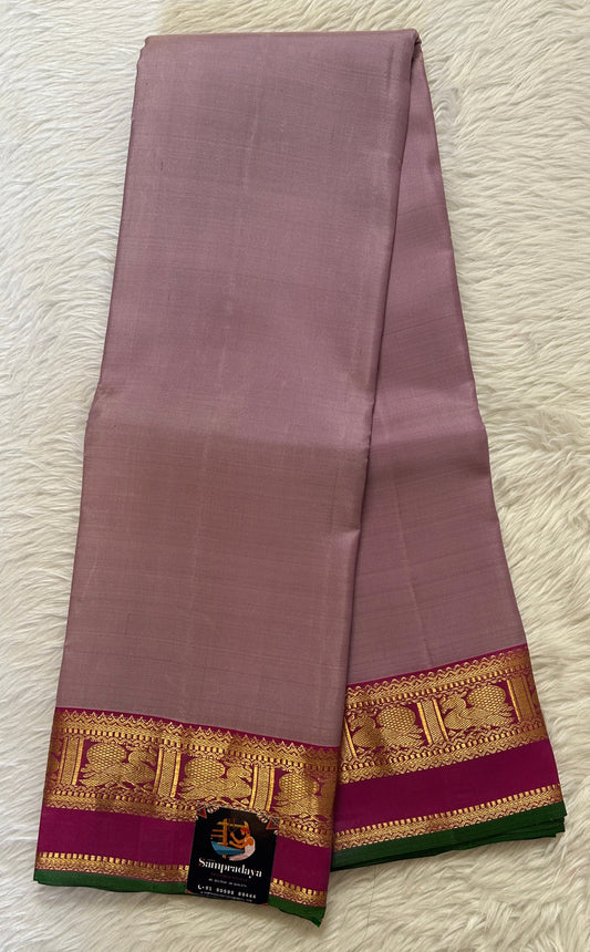 Kanjivaram Festive Silk Saree Dark Lavender colored Saree complemented with a Pink Colored Kanchi border. - Sampradaya Designer Studio