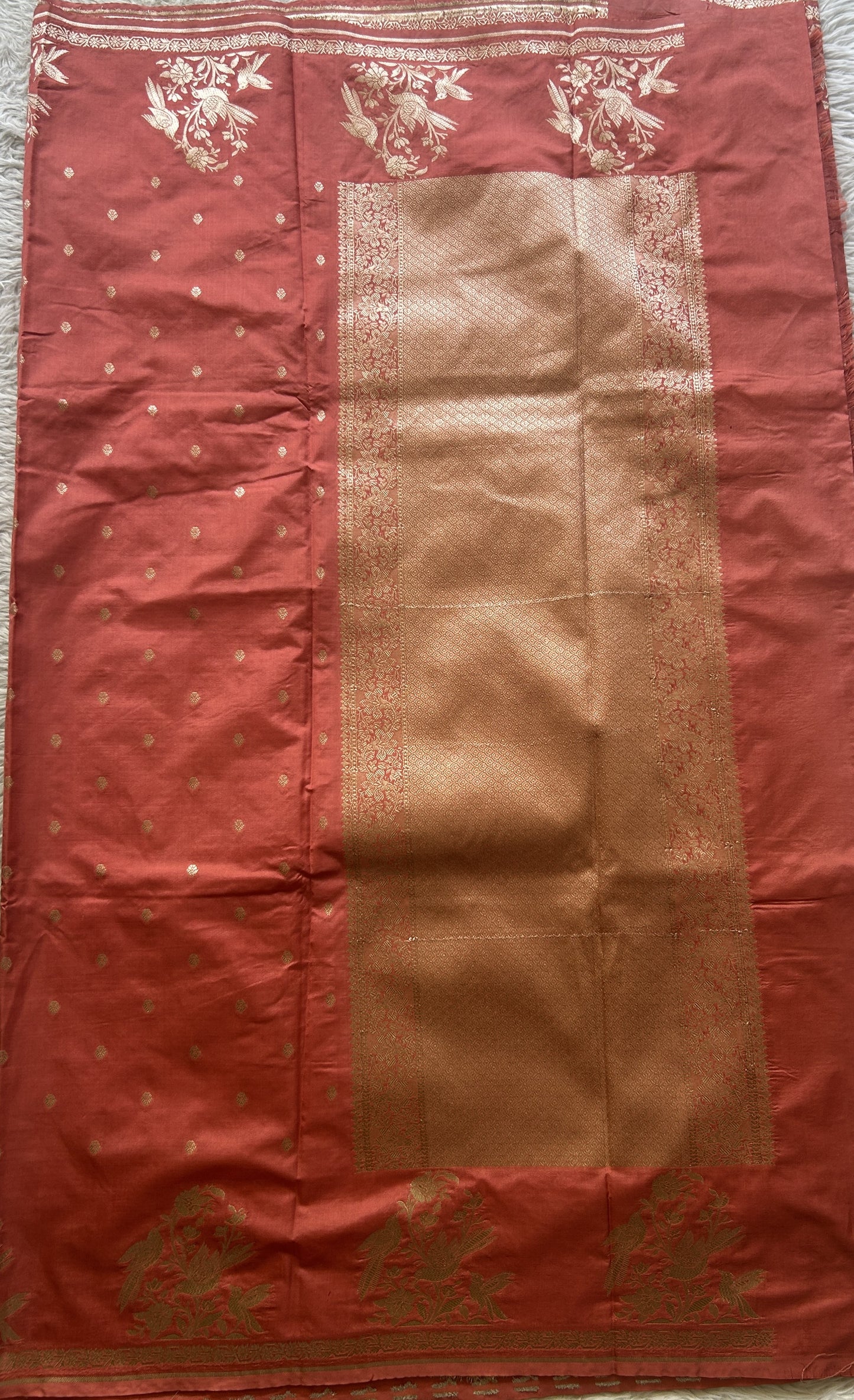 Semi Raw Silk Saree Peach Colored Elegantly Paired with a Buti Border. - Sampradaya Designer Studio