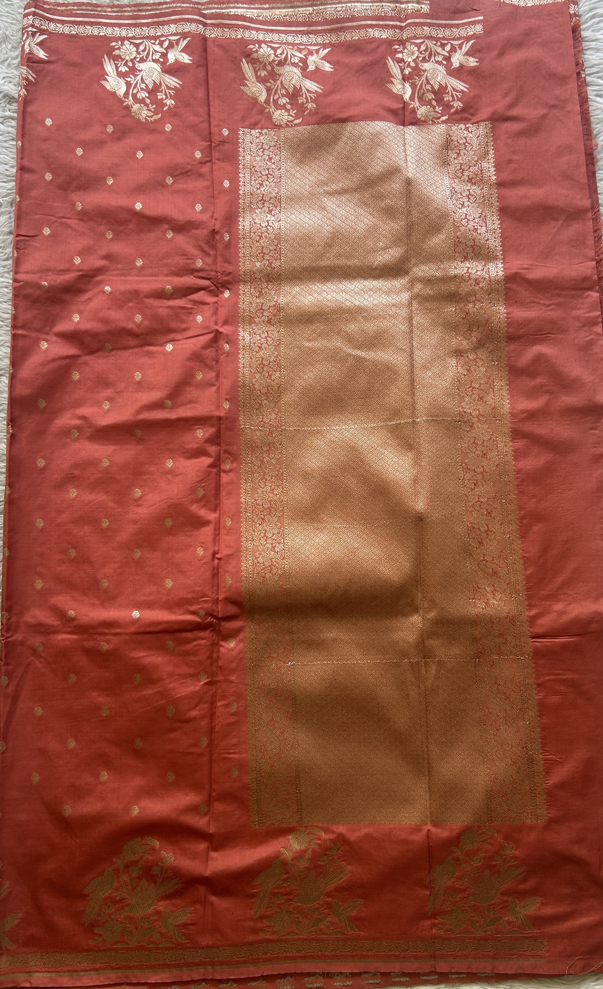Semi Raw Silk Saree Peach Colored Elegantly Paired with a Buti Border. - Sampradaya Designer Studio