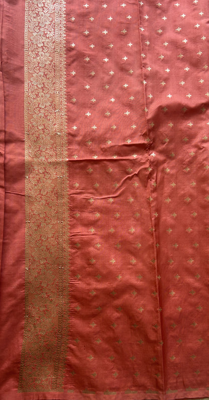 Semi Raw Silk Saree Peach Colored Elegantly Paired with a Buti Border. - Sampradaya Designer Studio