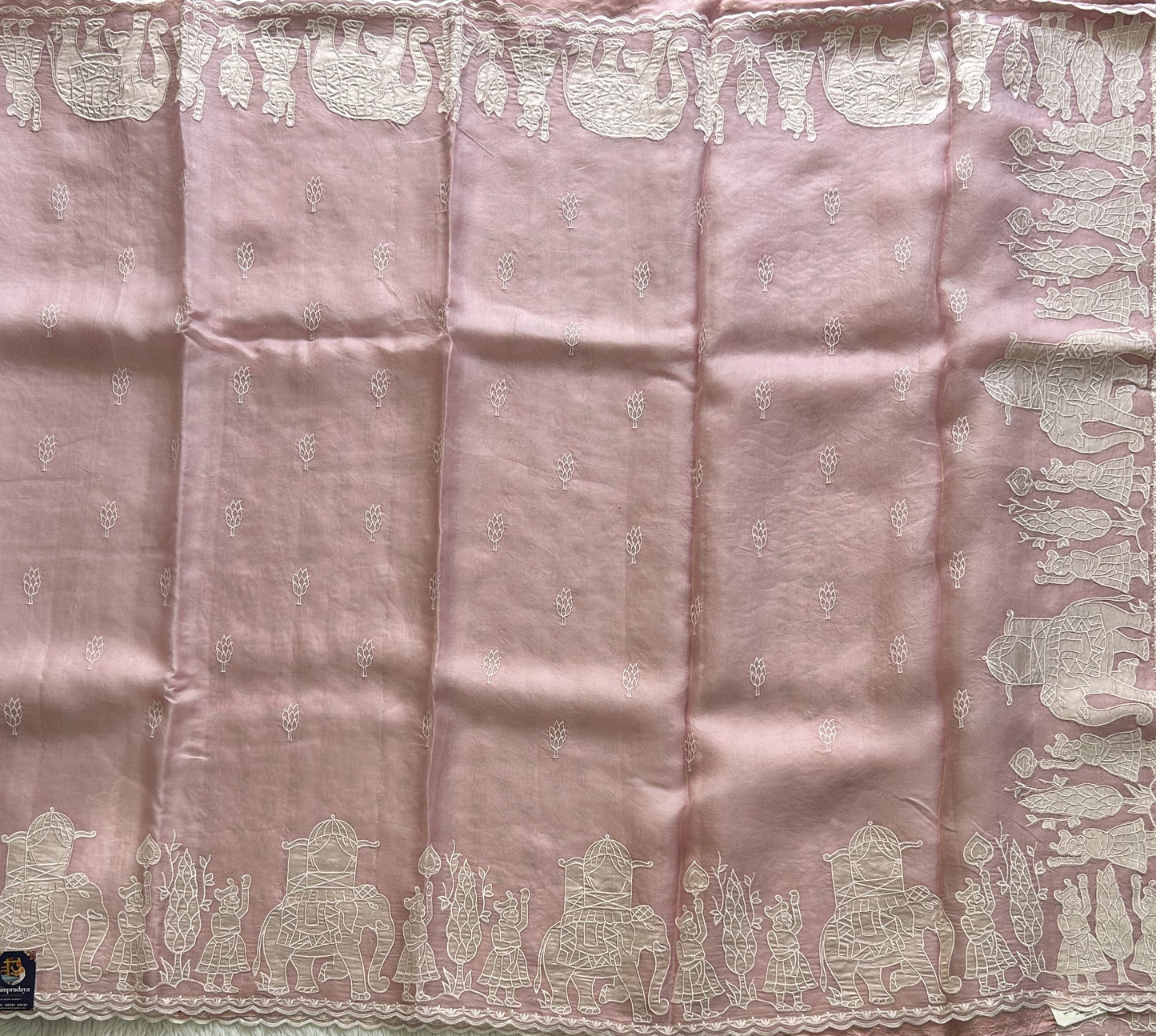 Banarasi Kora Saree Pastel Pink Colored Complemented with a  Machine Embroidery And Scallop Border.