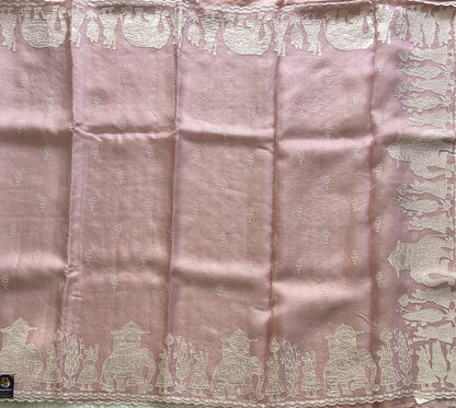 Banarasi Kora Saree Pastel Pink Colored Complemented with a  Machine Embroidery And Scallop Border.