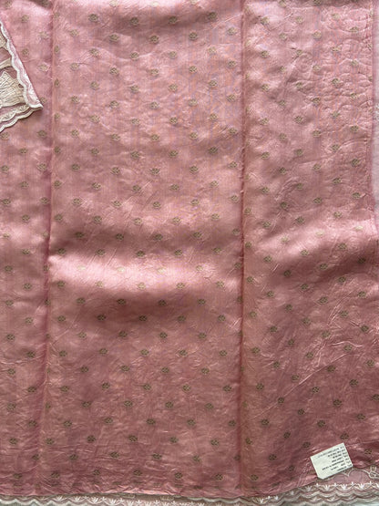 Banarasi Kora Saree Pastel Pink Colored Complemented with a  Machine Embroidery And Scallop Border.