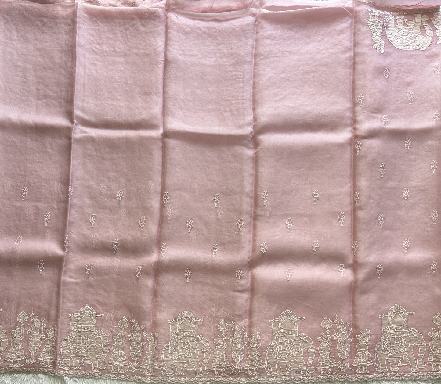 Banarasi Kora Saree Pastel Pink Colored Complemented with a  Machine Embroidery And Scallop Border.