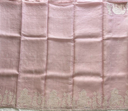 Banarasi Kora Saree Pastel Pink Colored Complemented with a  Machine Embroidery And Scallop Border.