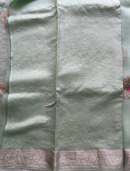 Banarasi Fancy Crushed Saree Pastel Green Colored Complemented with a Silver Zari Border.