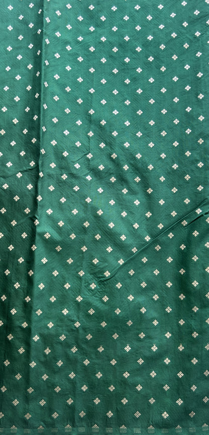 Semi Raw Silk Saree Bottle Green Colored Elegantly Paired with a Zari Border. - Sampradaya Designer Studio