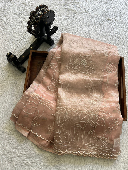 Banarasi Kora Saree Shell Peach Colored Complemented with a Scallop Border.