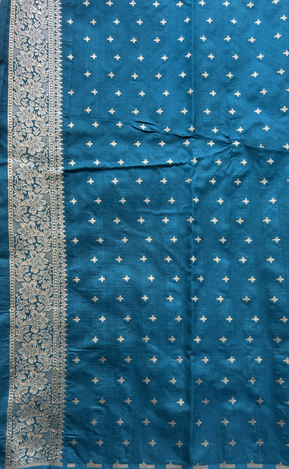 Semi Raw Silk Saree Peacock Blue Colored Elegantly Paired with a Buti Border. - Sampradaya Designer Studio
