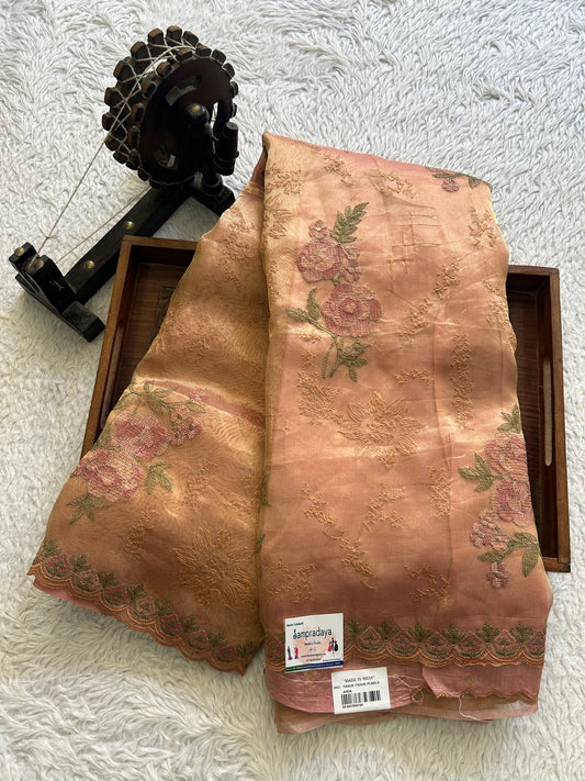 Banarasi Kora Saree Caramel Colored Complemented with a  Machine Embroidery And Scallop Border.