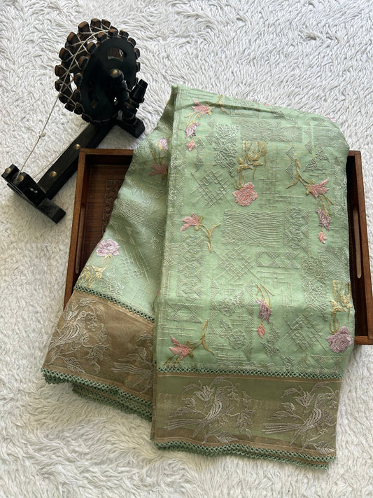 Banarasi Kora Saree Nebula Light Green Colored Complemented with a  Machine Embroidery And Tissue Border.