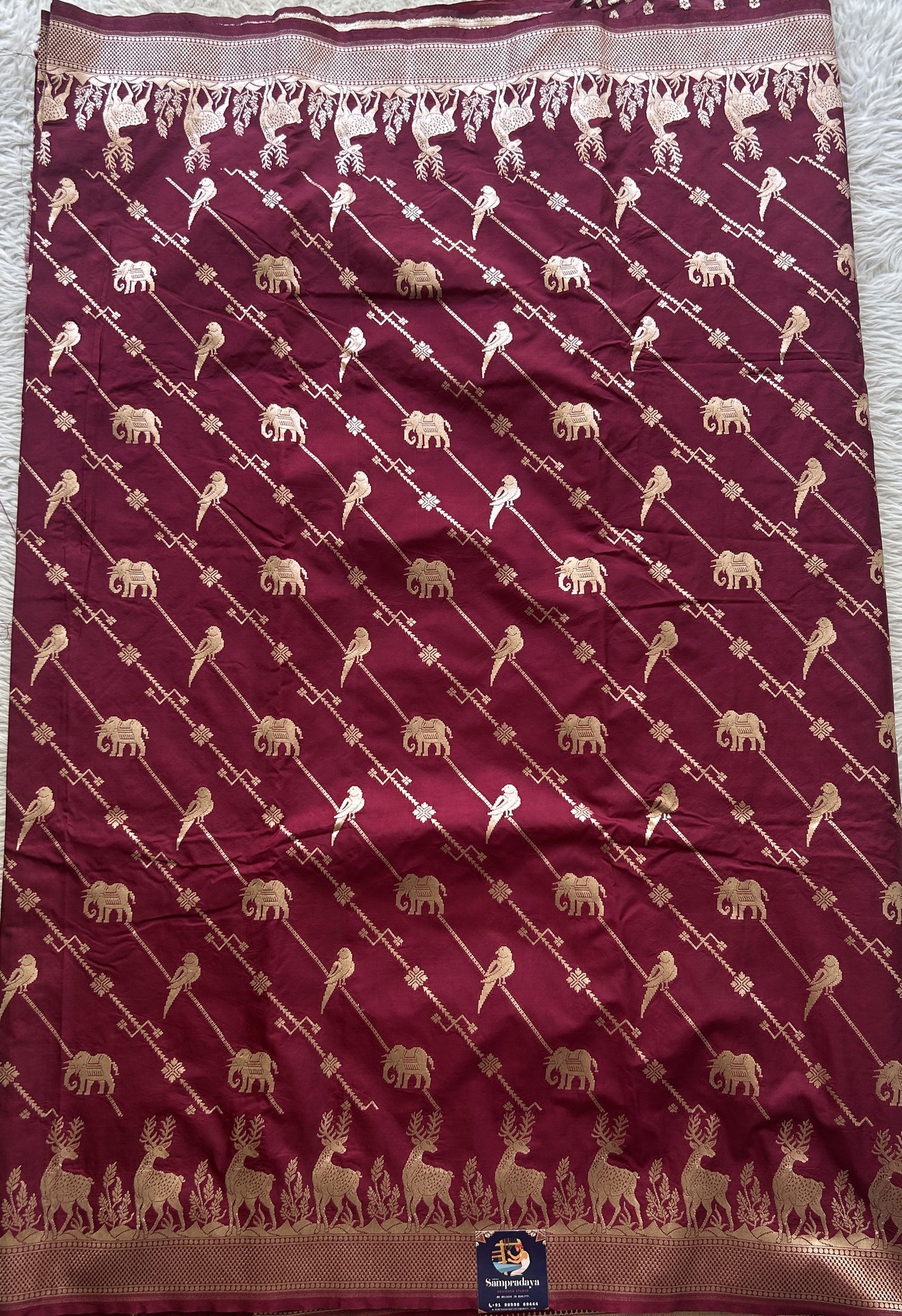 Semi Raw Silk Saree Deep Burgundy Colored Elegantly Paired with a Zari Border. - Sampradaya Designer Studio