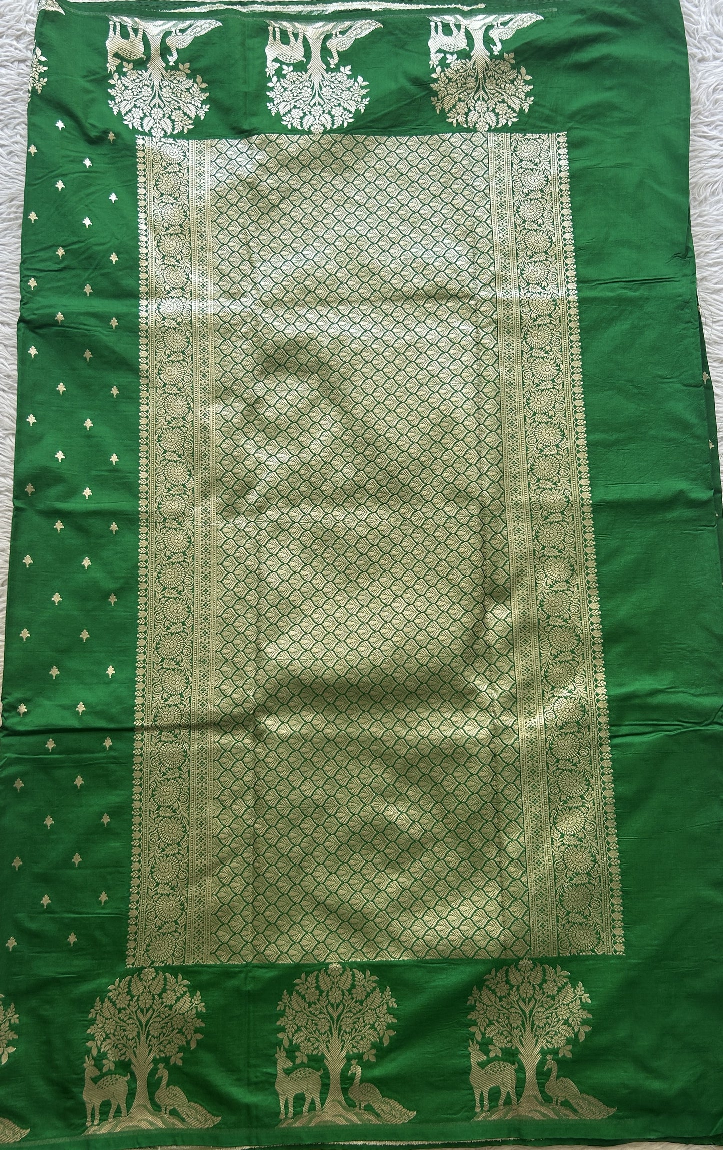 Semi Raw Silk Saree Green Colored Elegantly Paired with a Buti Border. - Sampradaya Designer Studio