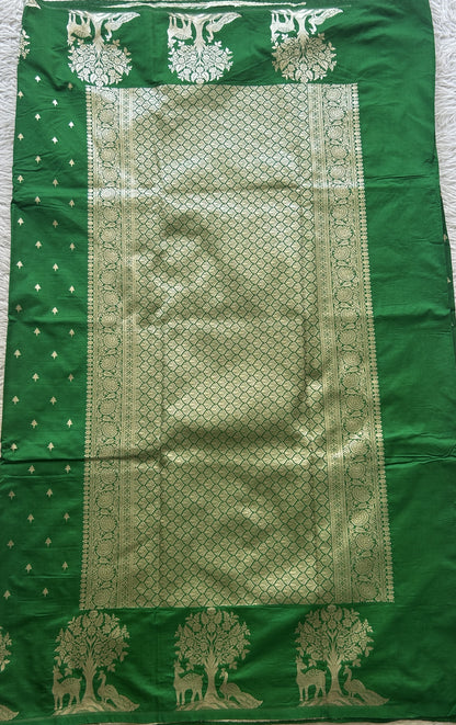 Semi Raw Silk Saree Green Colored Elegantly Paired with a Buti Border. - Sampradaya Designer Studio