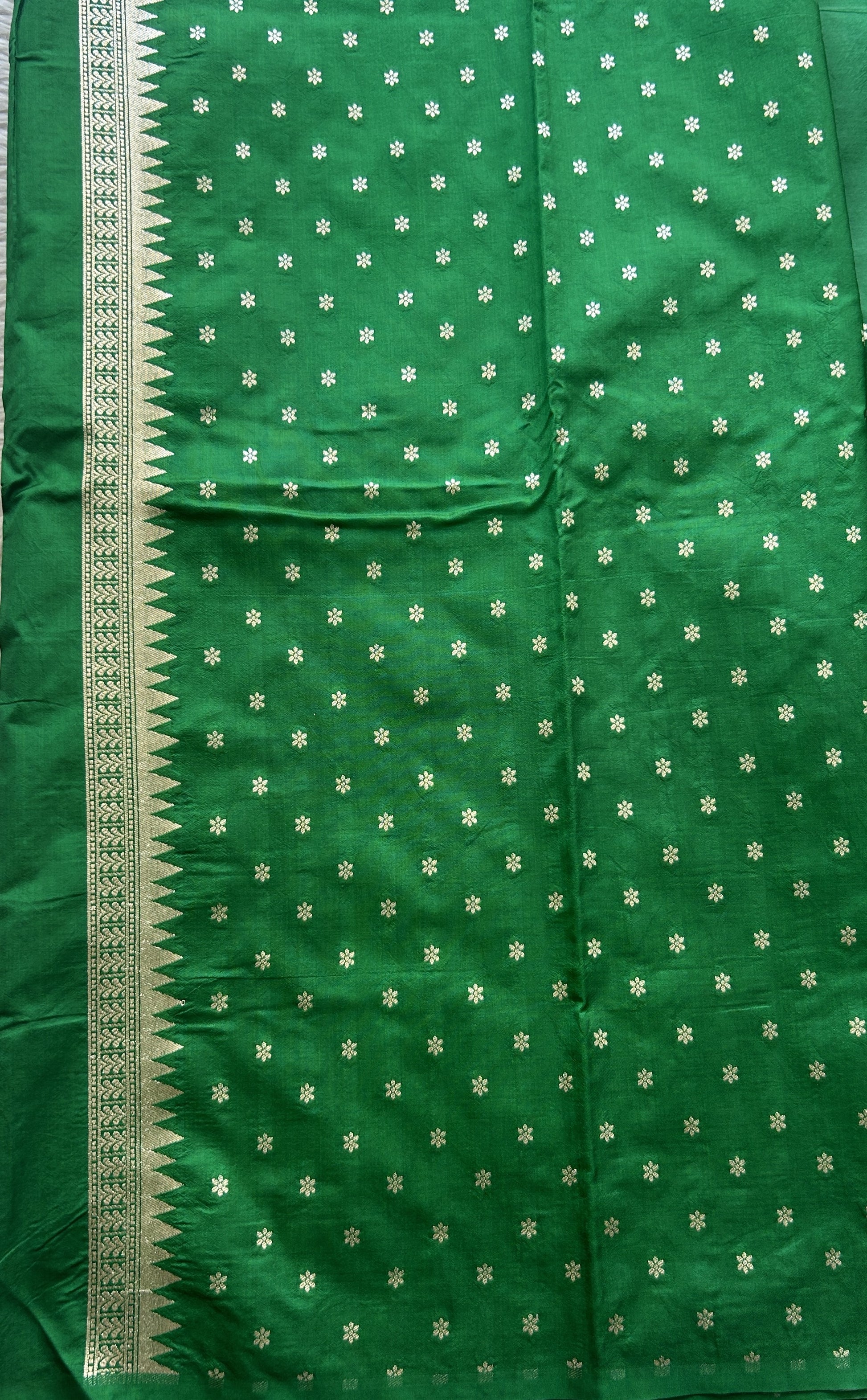 Semi Raw Silk Saree Green Colored Elegantly Paired with a Buti Border. - Sampradaya Designer Studio