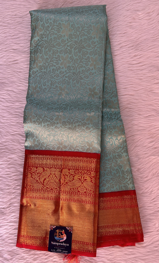 Kanjivaram Bridal Silk Saree Blue colored Saree complemented with a Red Colored Gold Kanchi border. - Sampradaya Designer Studio