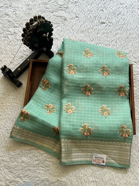 Banarasi Kora Saree Pastel Blue Colored Complemented with a Silver Zari Border.