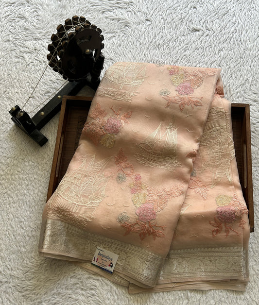 Banarasi Kora Saree Pastel Pink Colored Complemented with a Silver Zari Border.
