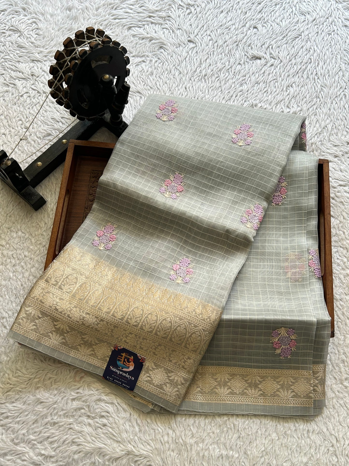 Banarasi Kora Saree Light Gray Colored Complemented with a Silver Zari Border.
