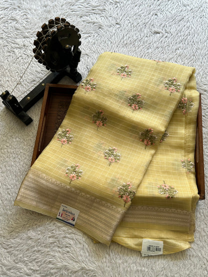Banarasi Kora Saree Banana Yellow Colored Complemented with a Silver Zari Border.