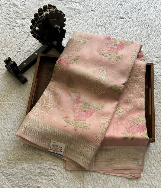 Banarasi Kora Saree Malibu peach Colored Complemented with a Silver Zari Border.