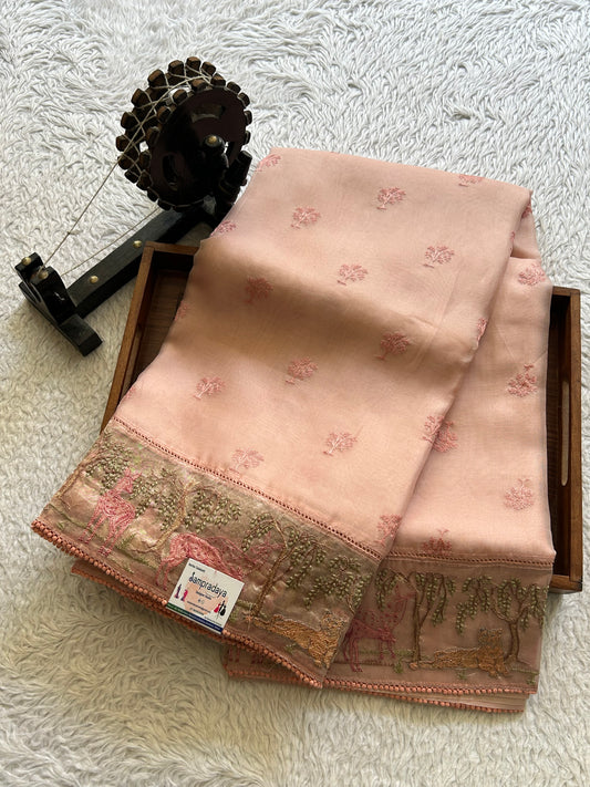 Banarasi Kora Saree Peach Colored Complemented with a Machine Embroidered Border.