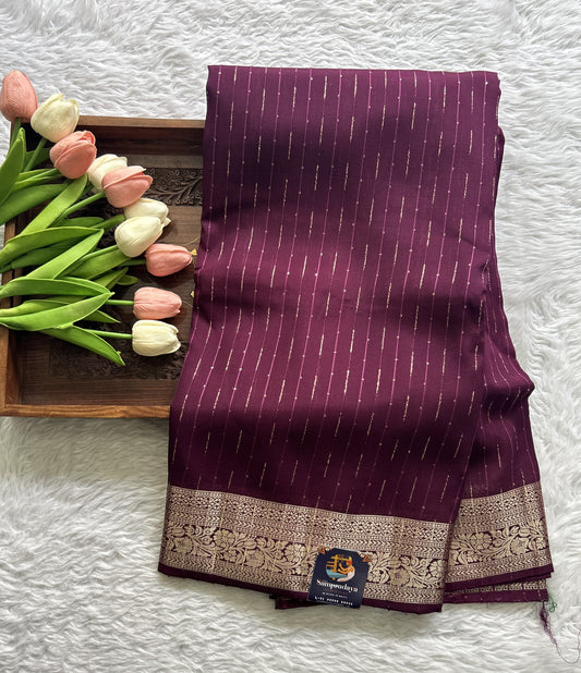 Semi Georgette Saree Purple Colored Complemented with a Zari Border. - Sampradaya Designer Studio