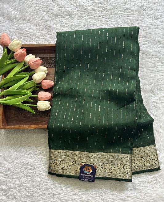 Semi Georgette Saree Bottle Green Colored Complemented with a Zari Border. - Sampradaya Designer Studio