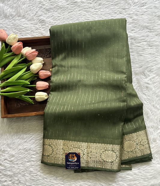 Semi Georgette Saree Light Green Colored Complemented with a Zari Border. - Sampradaya Designer Studio