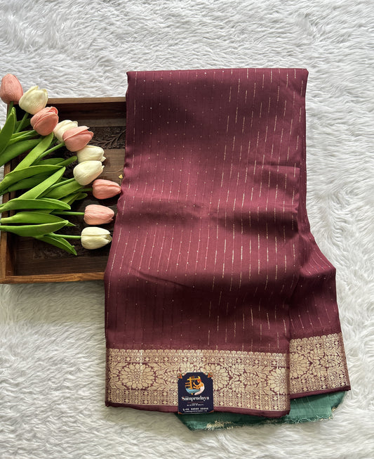 Semi Georgette Saree Mauve Colored Complemented with a Zari Border. - Sampradaya Designer Studio