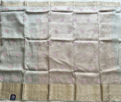 Banarasi Kora Saree Light Gray Colored Complemented with a Silver Zari Border.