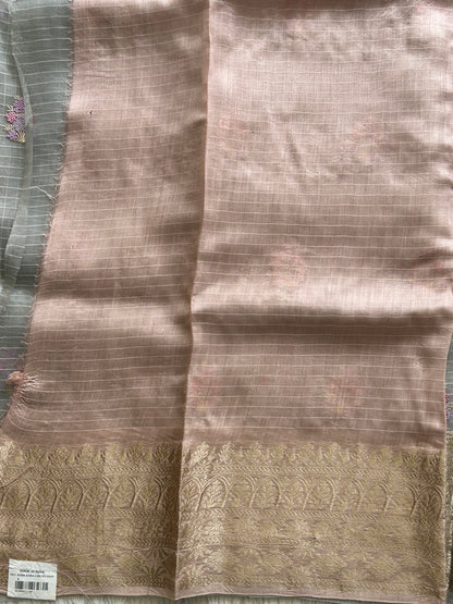 Banarasi Kora Saree Light Gray Colored Complemented with a Silver Zari Border.