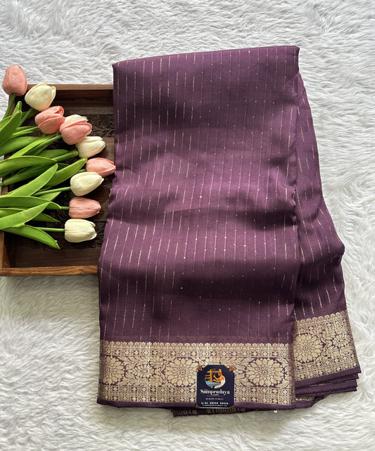Semi Georgette Saree Lavender Colored Complemented with a Zari Border. - Sampradaya Designer Studio