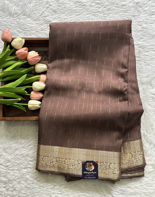 Semi Georgette Saree Dark Beige Colored Complemented with a Zari Border. - Sampradaya Designer Studio