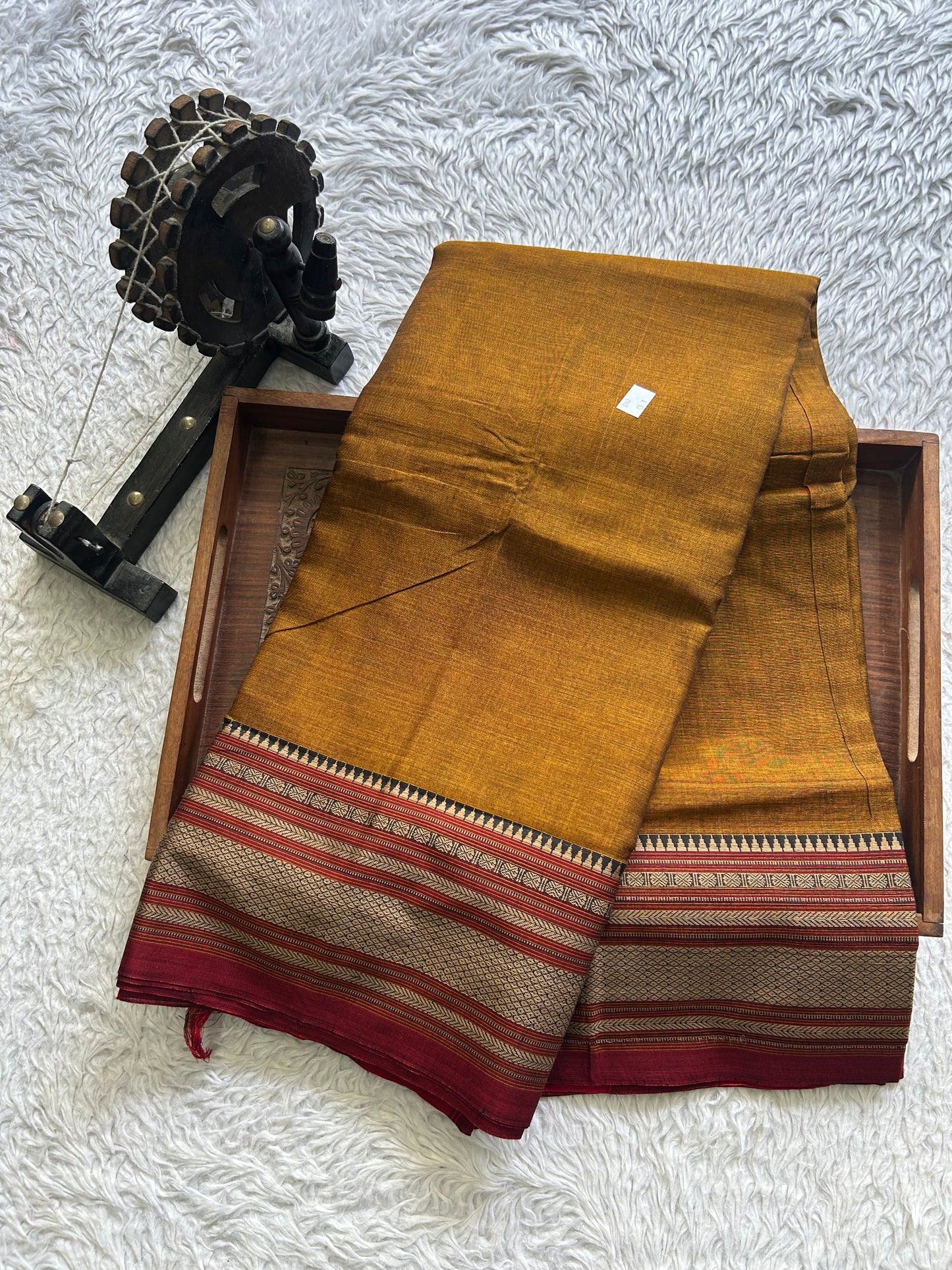 Narayanpet Cotton Saree Burnt Colored Complemented with a Thread Border. - Sampradaya Designer Studio