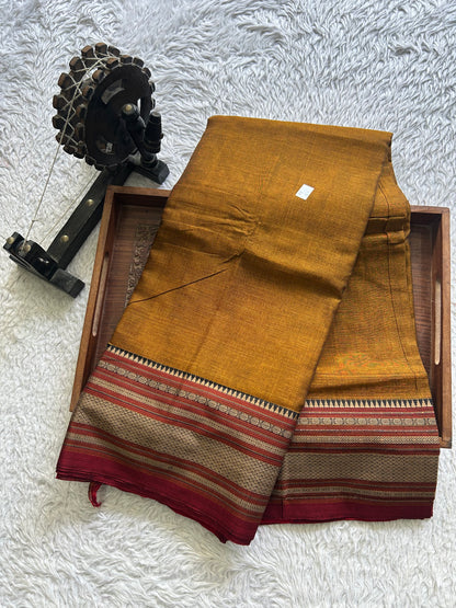 Narayanpet Cotton Saree Burnt Colored Complemented with a Thread Border. - Sampradaya Designer Studio