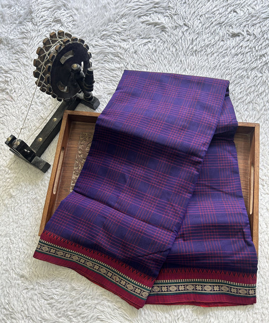 Narayanpet Cotton Checks Saree Purple Colored Complemented with a Thread Border.