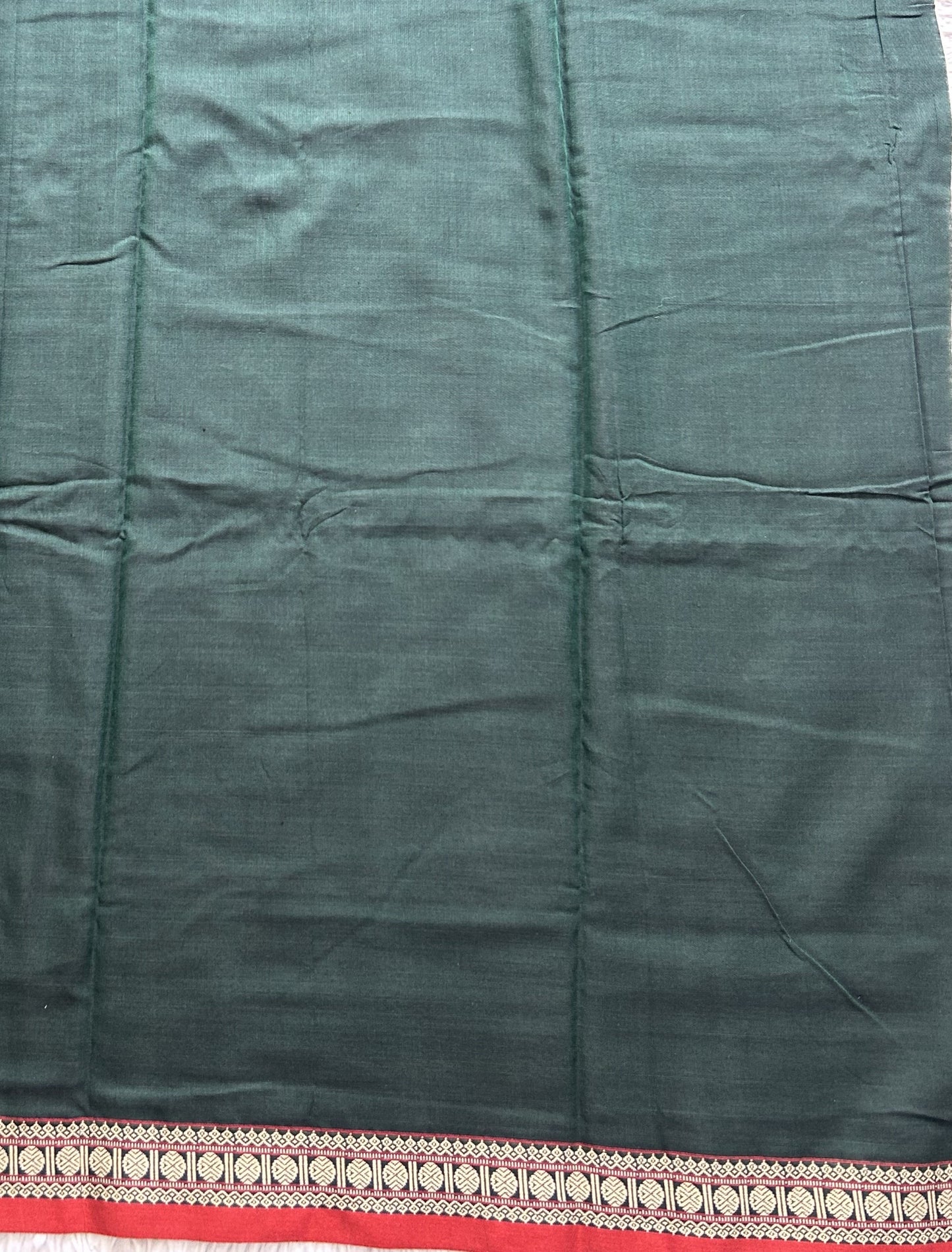 Narayanpet Cotton Saree Sacramento Green Colored Complemented with a Thread Border.