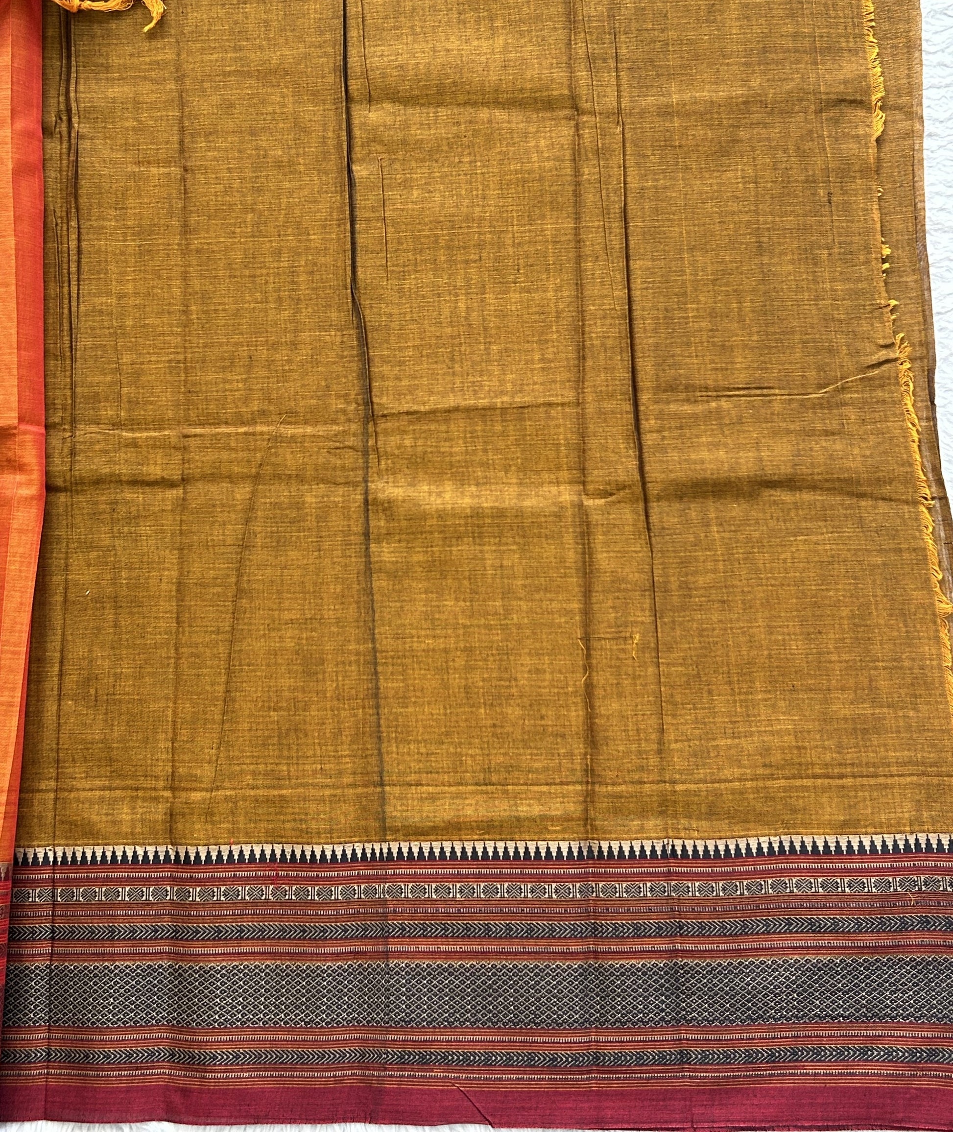 Narayanpet Cotton Saree Burnt Colored Complemented with a Thread Border. - Sampradaya Designer Studio