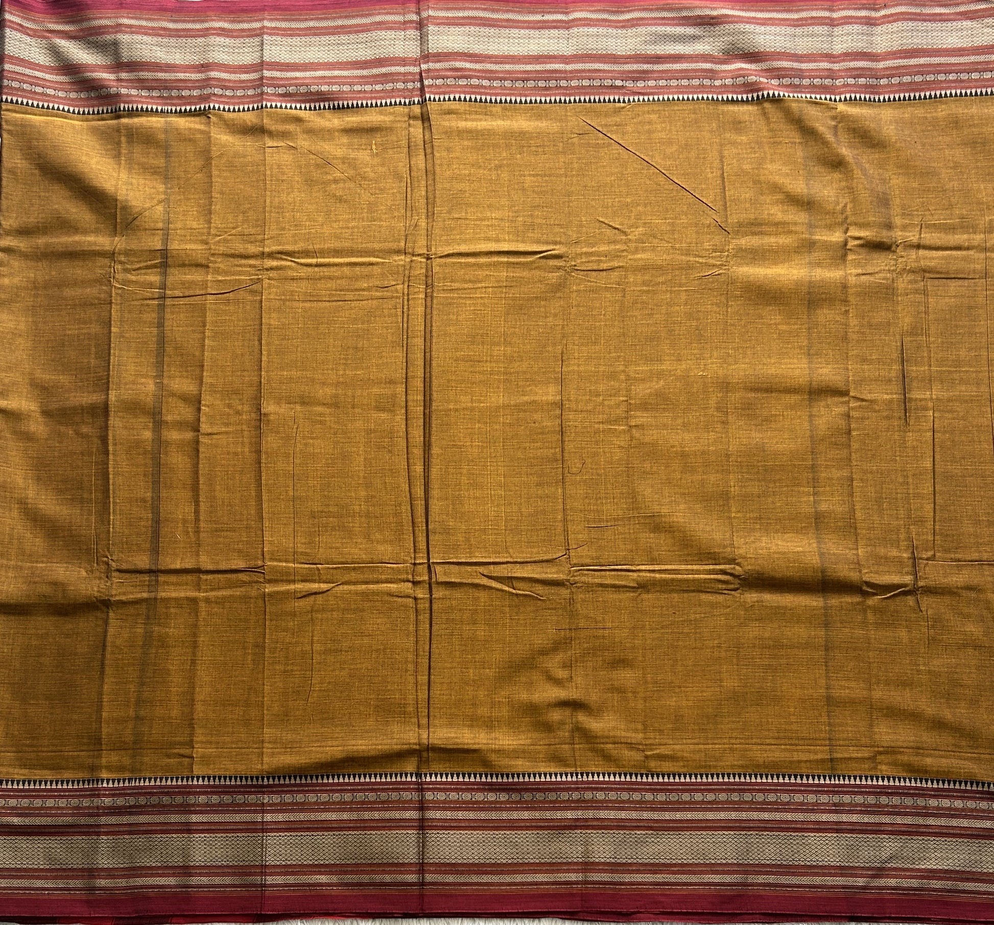 Narayanpet Cotton Saree Burnt Colored Complemented with a Thread Border. - Sampradaya Designer Studio