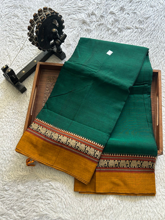 Narayanpet Cotton Saree Ever Green Colored Complemented with a Thread Border.