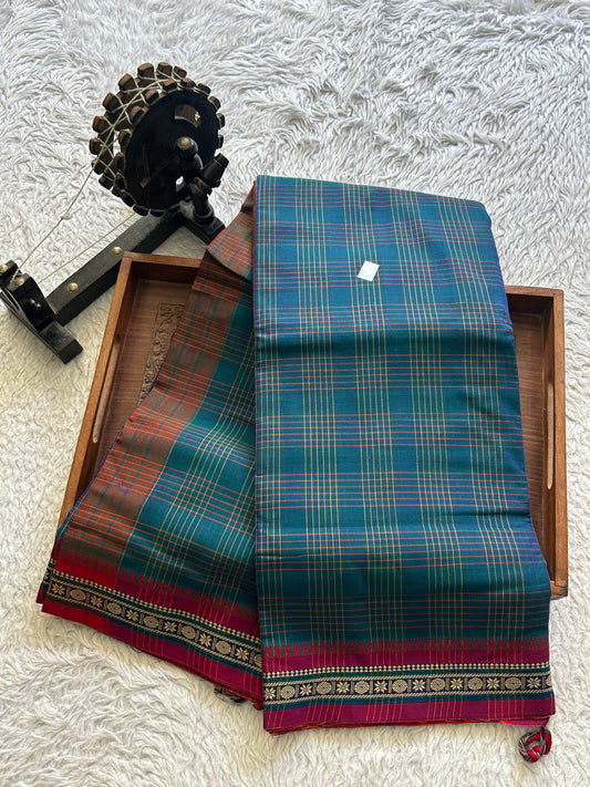 Narayanpet Cotton Checks Saree Dark Turquoise Blue Colored Complemented with a Thread Border.
