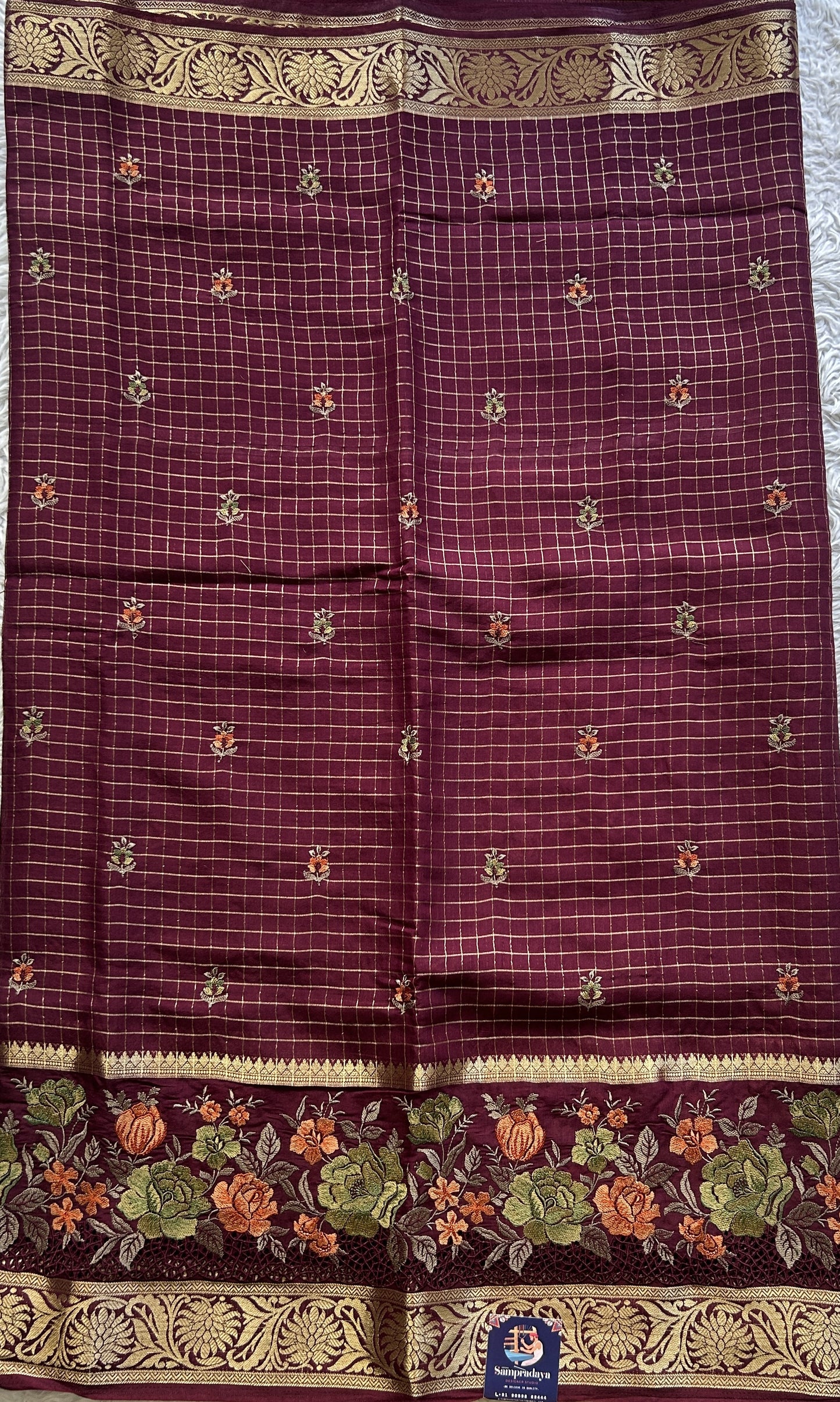 Semi Georgette Checks Saree Burgundy Colored Complemented with a Cutwork Border. - Sampradaya Designer Studio