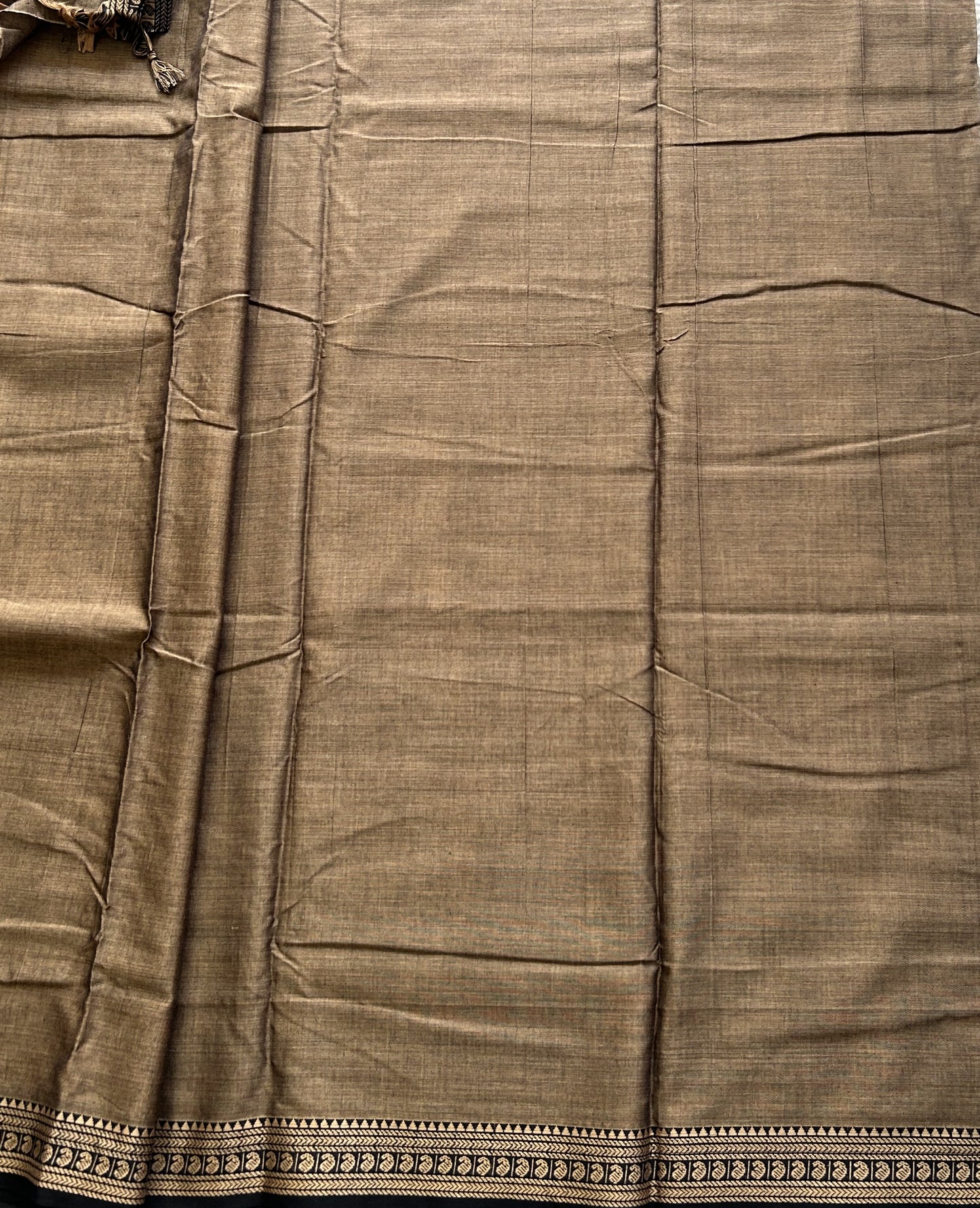 Narayanpet Cotton Saree Stone Colored Complemented with a Thread Border.